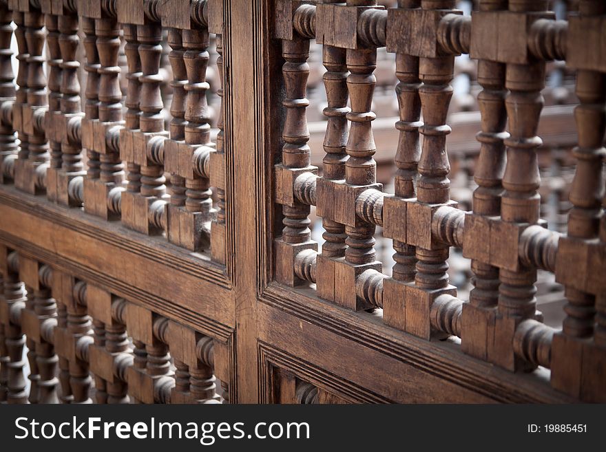 A detail of the railing on the first floow of the Medersa Ben Youssef, the beautiful Quran School located in the heart of Marrakesh, Morocco. A detail of the railing on the first floow of the Medersa Ben Youssef, the beautiful Quran School located in the heart of Marrakesh, Morocco