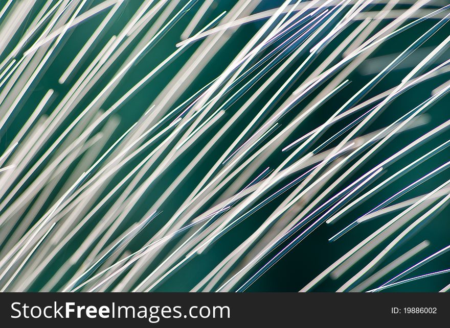 Colorful sparks on green background
