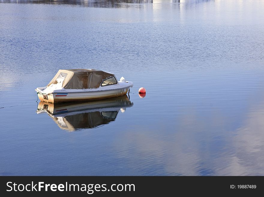 A small boat in the harbour of beautiful Alta, Norway. A small boat in the harbour of beautiful Alta, Norway