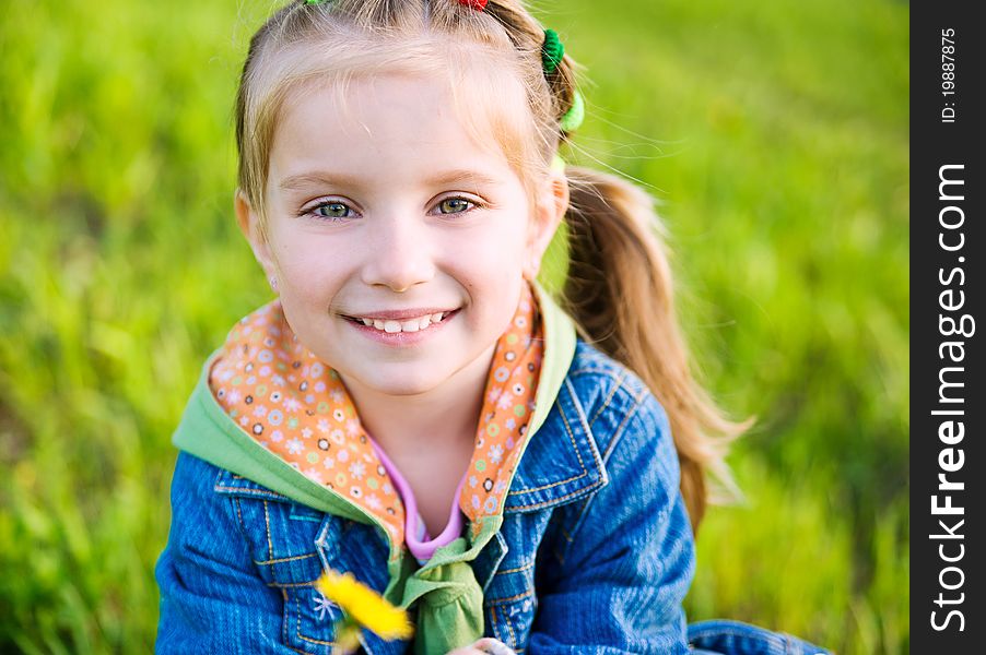 Cute little girl on the meadow in spring day. Cute little girl on the meadow in spring day