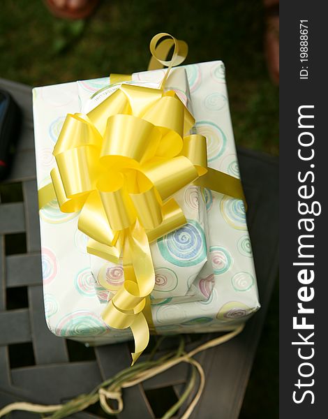 Wrapped Gift With Yellow Ribbon
