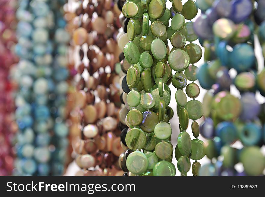 Close up of colorful necklaces