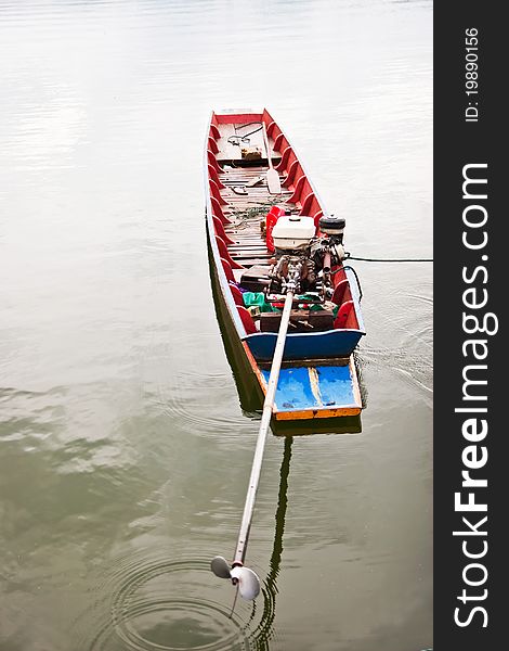 Long tail boat along the lake