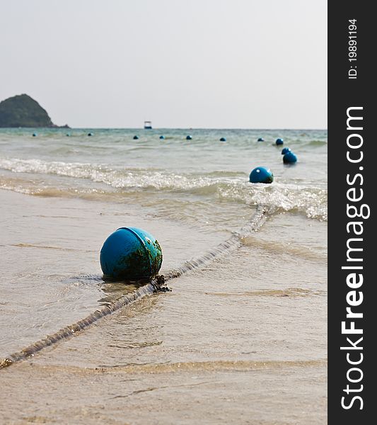 Blue buoy on the beach. Blue buoy on the beach