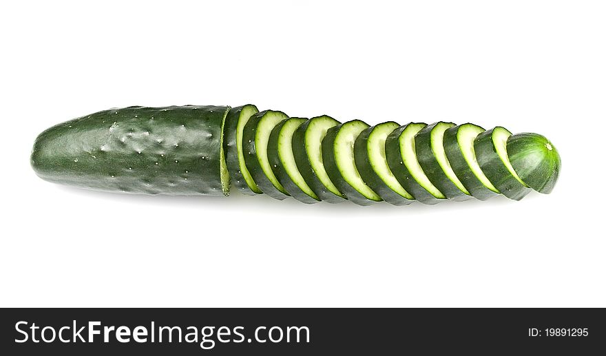 Sliced cucumber isolated over a white background