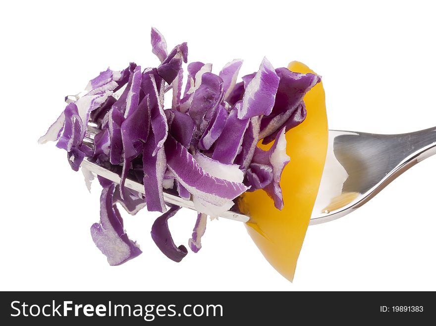 Vegetable sandwich on a fork of the cabbage and pepper