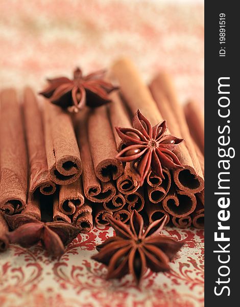 Aromatic spices isolated on a floral background