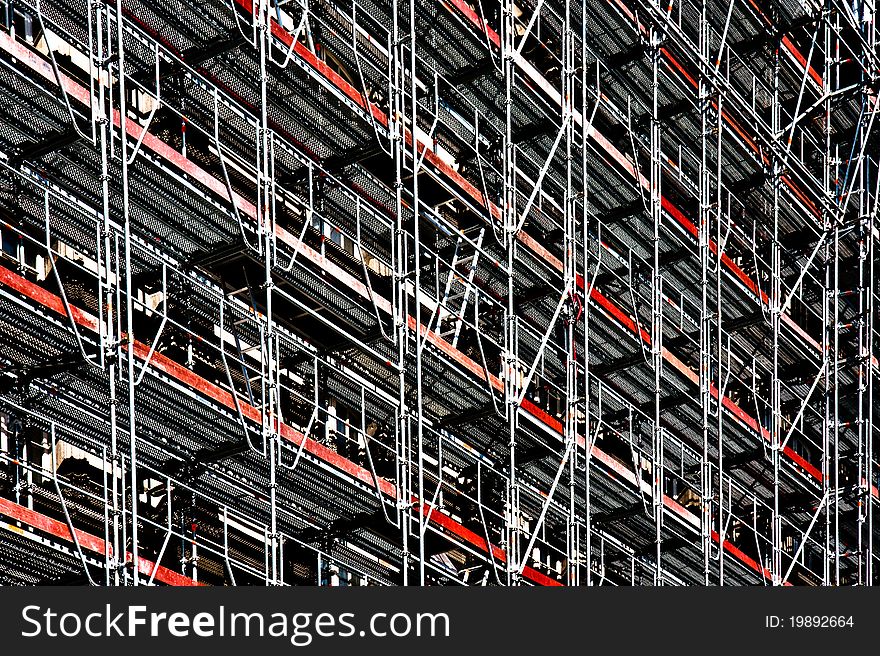 Stylised image of scaffolding on the side of a building