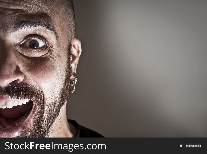 Mid-frontal portrait of a man yelling