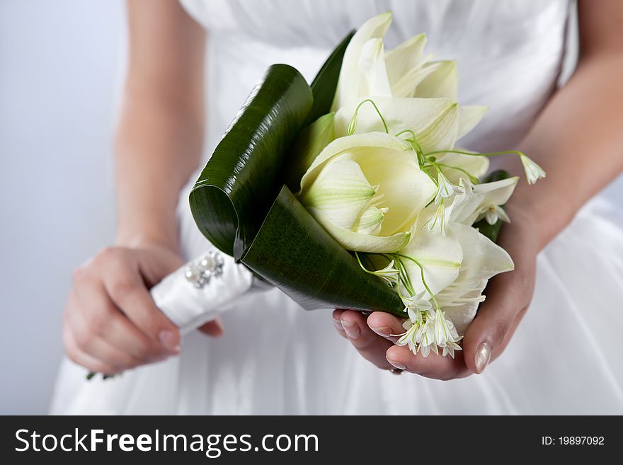 Wedding bouquet of white lilies