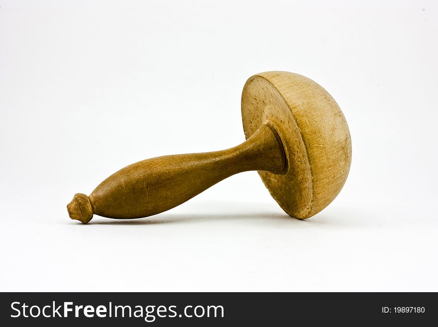 Wooden mold for mending socks in a horizontal position on a white background