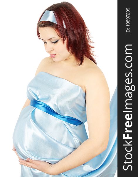 The beautiful pregnant woman in the blue cloth