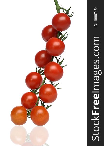 Juicy red tomatoes on the isolated background