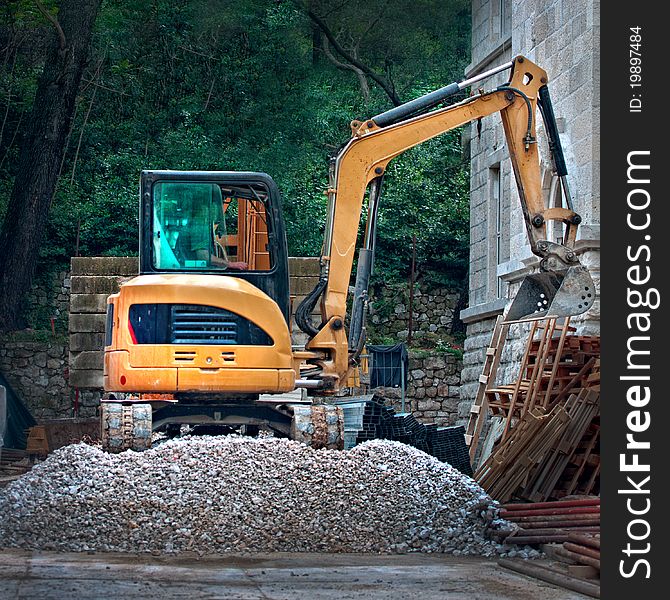 Heavy digger machine vehicle working at place