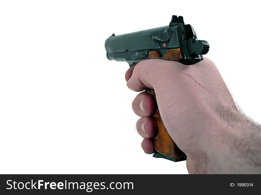 Hand holding a pistol isolated on white