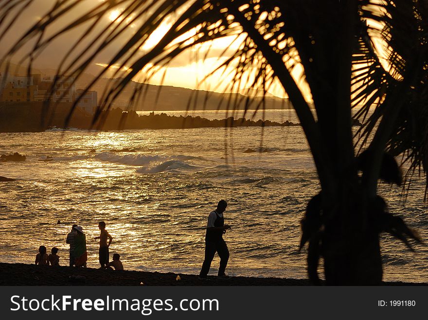 Sunset at the beach, in Puerto Cruz, Canary Islands, Spain