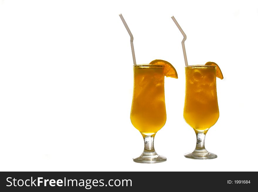 Two glasses of juice isolated over white