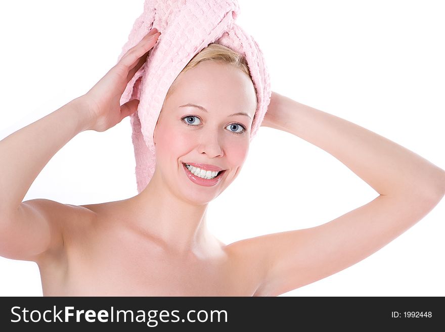 Beautiful woman in towel on head with blue eye and smile white teeth on white background