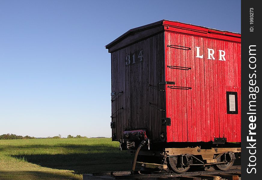 Railroad car in the late afternoon sun. Railroad car in the late afternoon sun