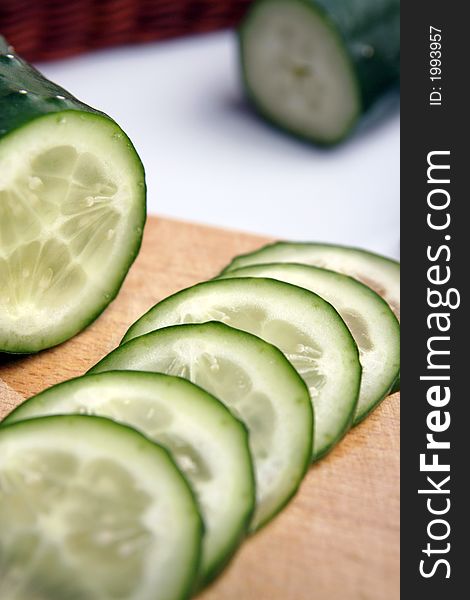 Fresh Cucumber in kitchen background