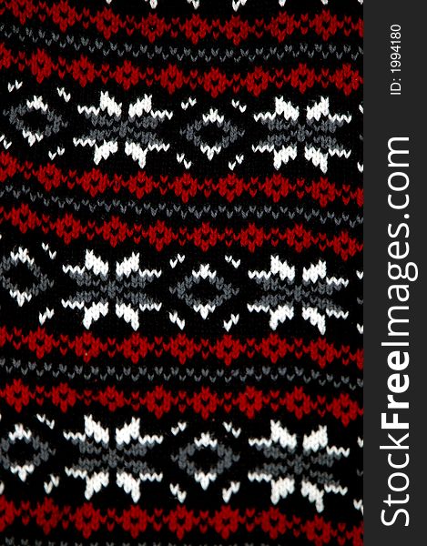 Close up of a beautifully woven sweater pattern. Close up of a beautifully woven sweater pattern