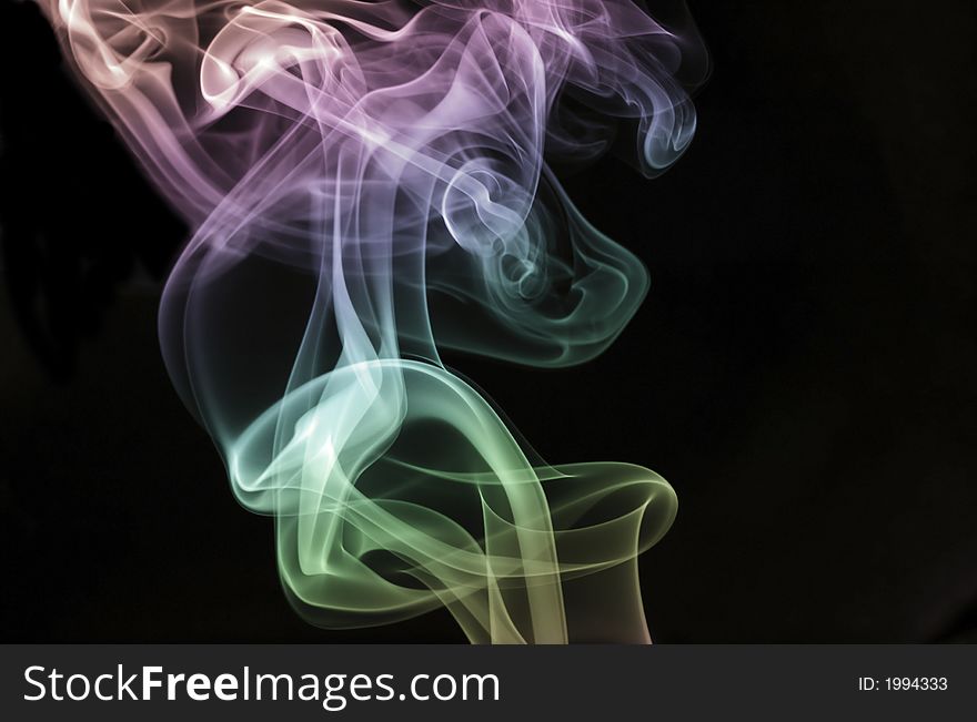 Rising pastel smoke abstract from burning inscense.