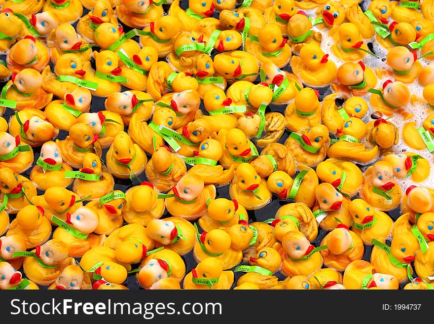 Rubber duckies taking a wild ride I a river