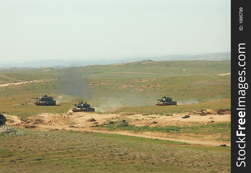 Tanks attack in a military exercise. Tanks attack in a military exercise