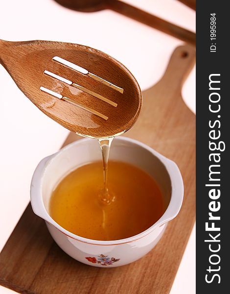 Delicious honey isolated on white