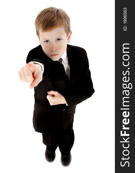 Little boy dressed in a suit pointing finger; full body on white background. Little boy dressed in a suit pointing finger; full body on white background