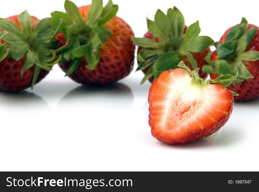 Half a Strawberry and a bunch of them. Half a Strawberry and a bunch of them