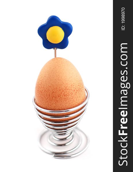 Eggs stainless Steel holder with egg isolated on white.