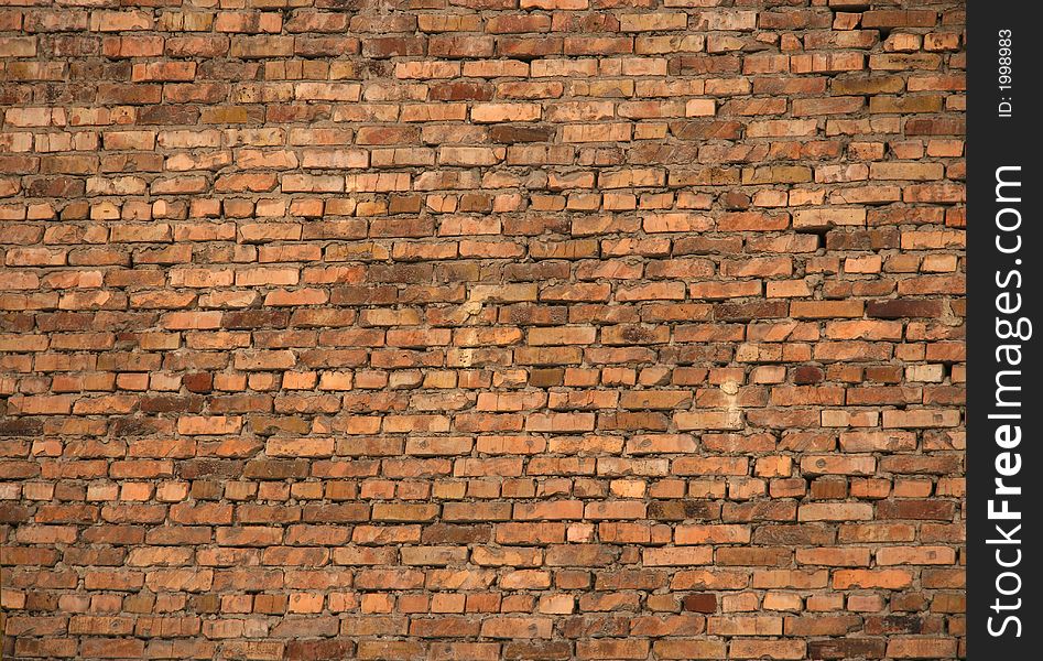 Old flat brick wall from a brown brick. Old flat brick wall from a brown brick.