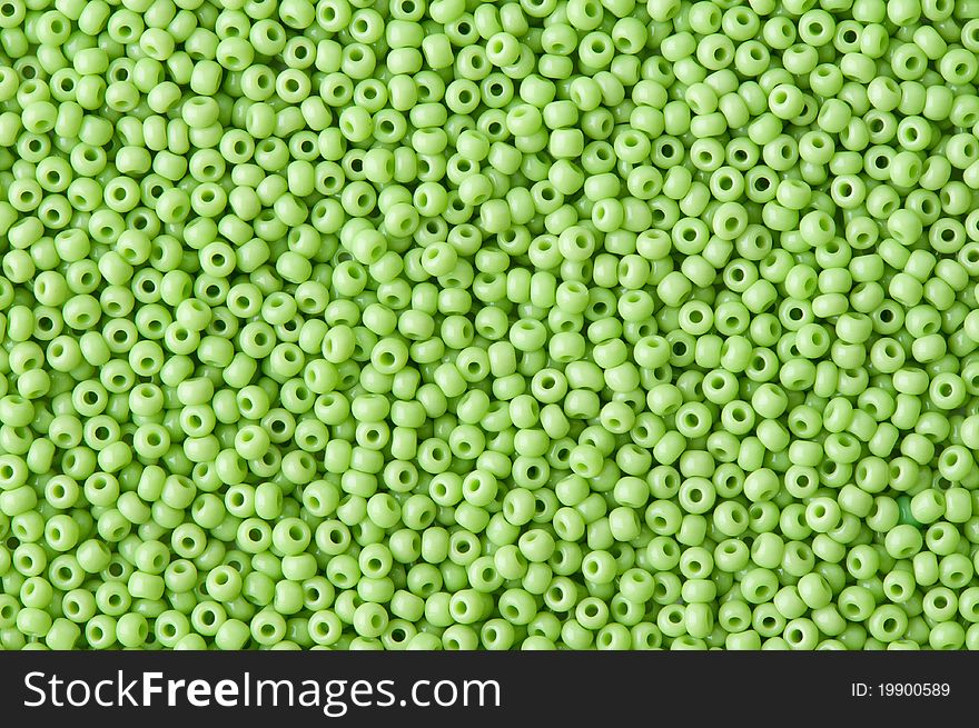 Background of green beads close up