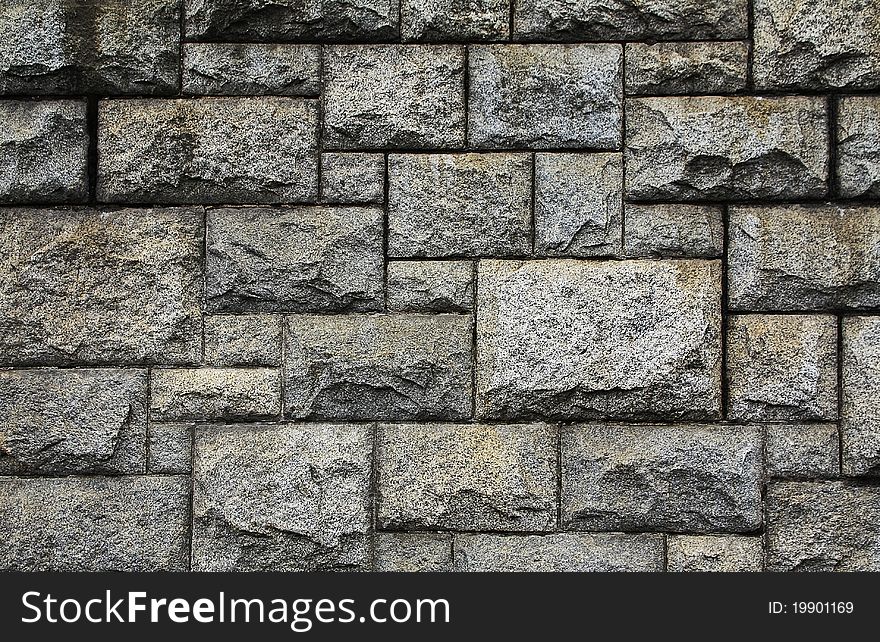The stone wall close up.