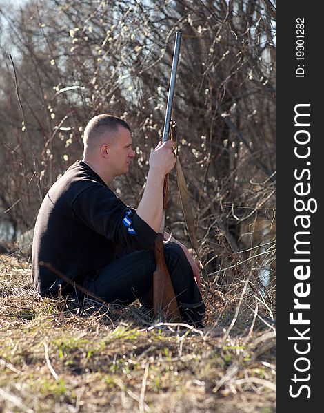 Male hunter aiming the hunt during a hunting party