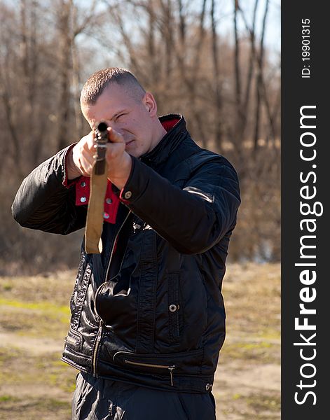 Male hunter aiming the hunt during a hunting party