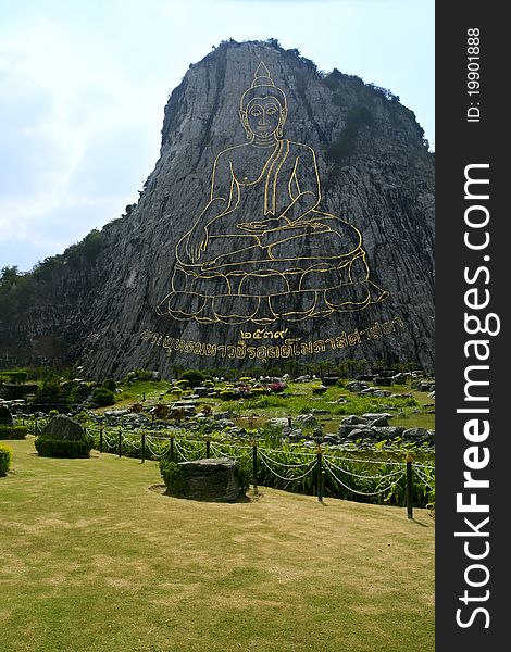 Gold Contour Of The Buddha On A Mountain