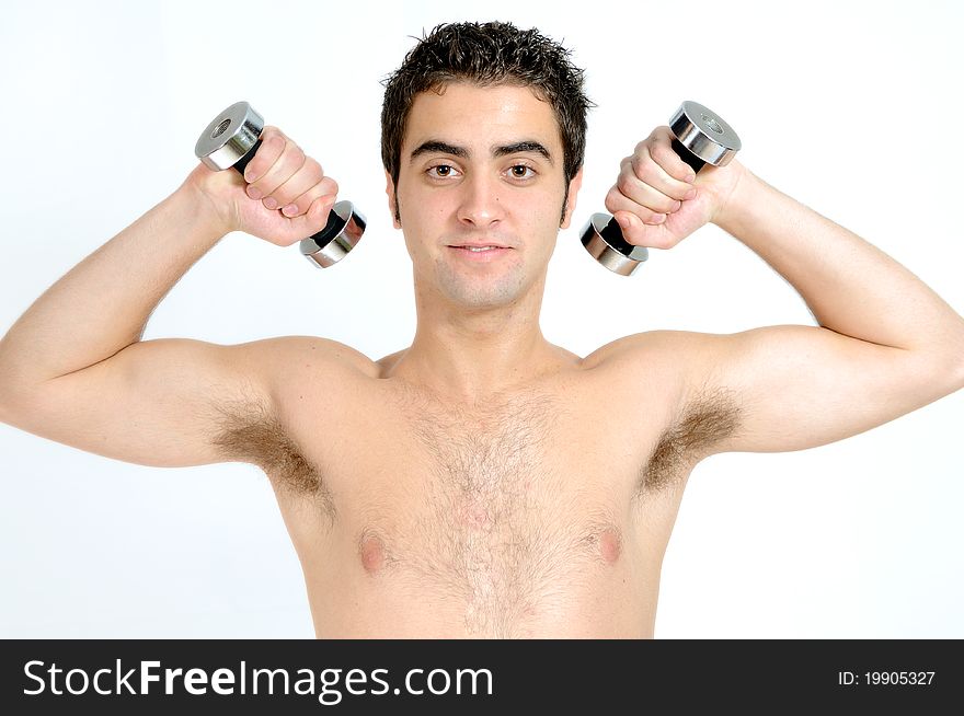 A Young man lifting weights on white background. A Young man lifting weights on white background