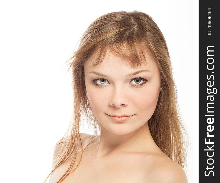 Blonde girl looking at camera, isolated on a white