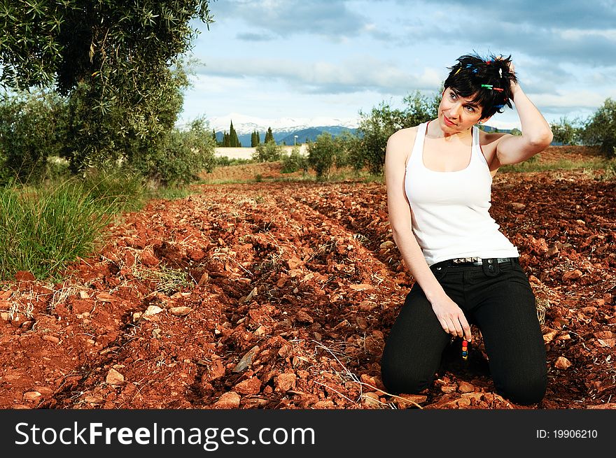 Woman with clothespins and necklace in a farm