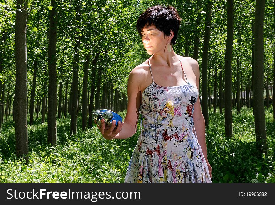 Woman showing the time on a clock. Woman showing the time on a clock