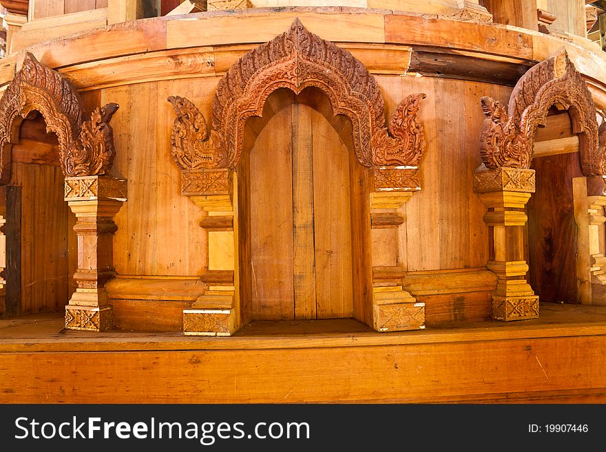 The carved wooden doors patterned on the temple. The carved wooden doors patterned on the temple.