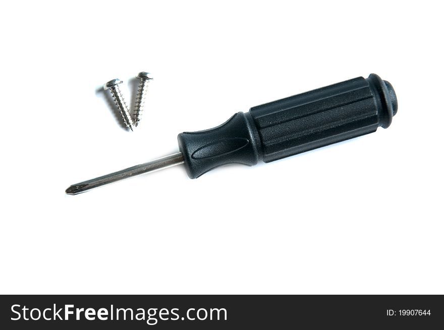 Isolated screwdriver with some screws. Isolated screwdriver with some screws.