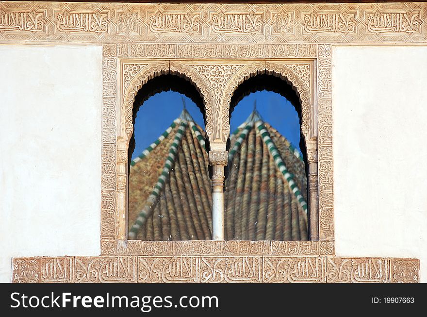 Two domes reflected in a window of the Palace of Comares in the Alhambra, Granada, Andalucia, Spain. Two domes reflected in a window of the Palace of Comares in the Alhambra, Granada, Andalucia, Spain