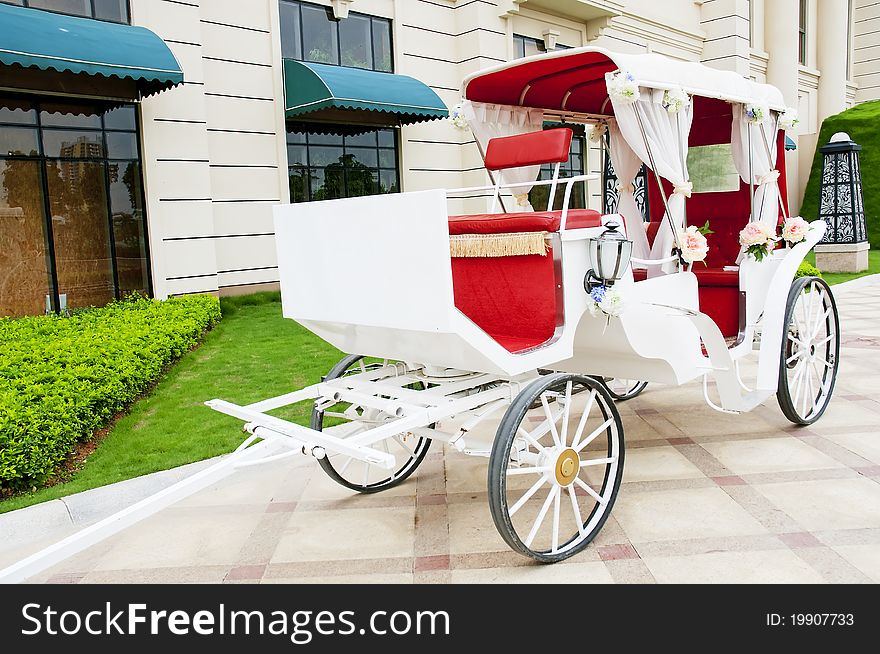 A beautiful  white  Old Horse Carriage