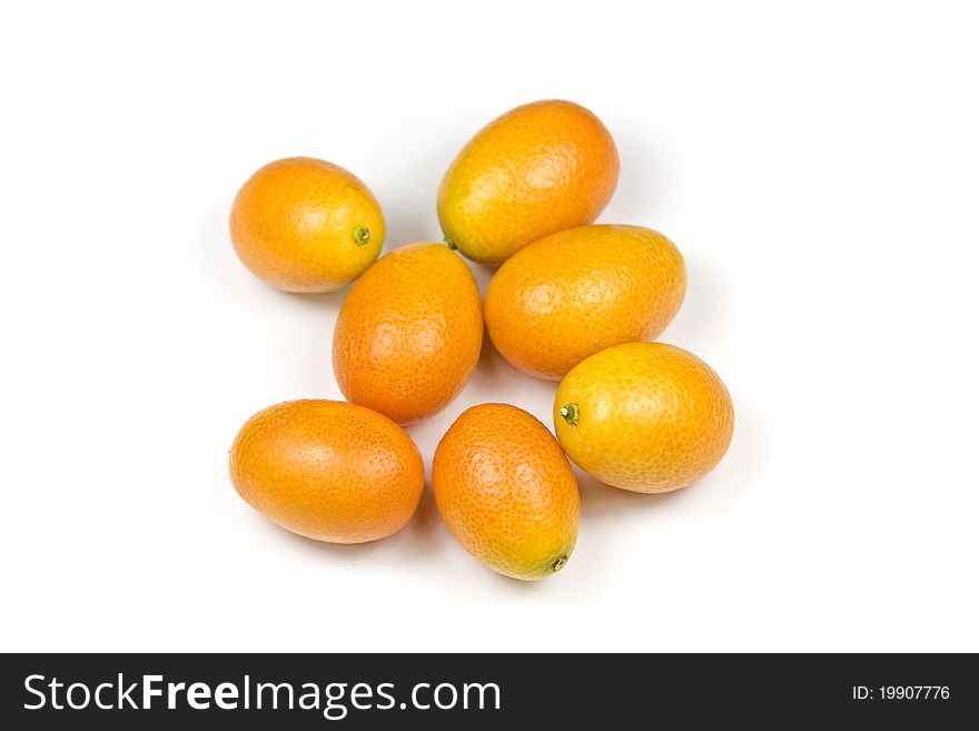 Fresh kumquat isolated on a white background. Fresh kumquat isolated on a white background