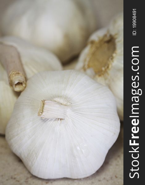 A close-up image of a bunch of fresh garlic