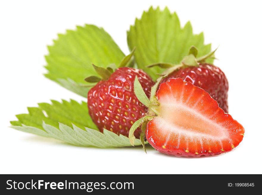 Three fresh strawberries isolated on white. Three fresh strawberries isolated on white
