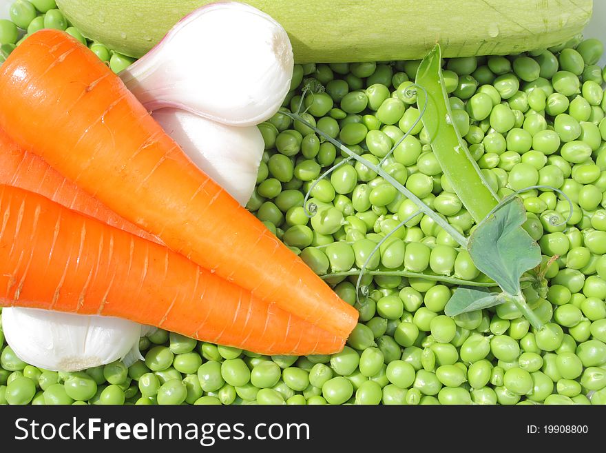 Prepared green peas, carrot, onion and squash. Prepared green peas, carrot, onion and squash